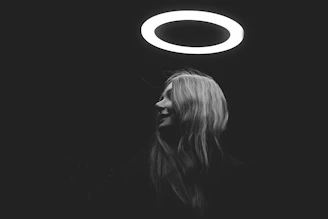 a person looking up at a planet