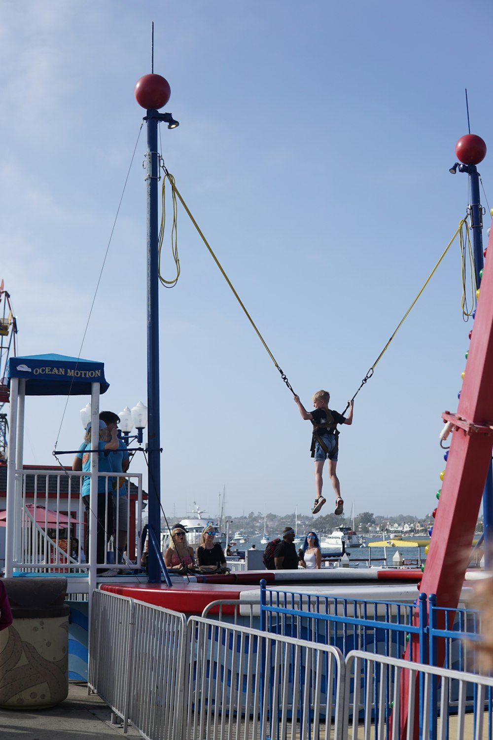 a person jumping off a boat