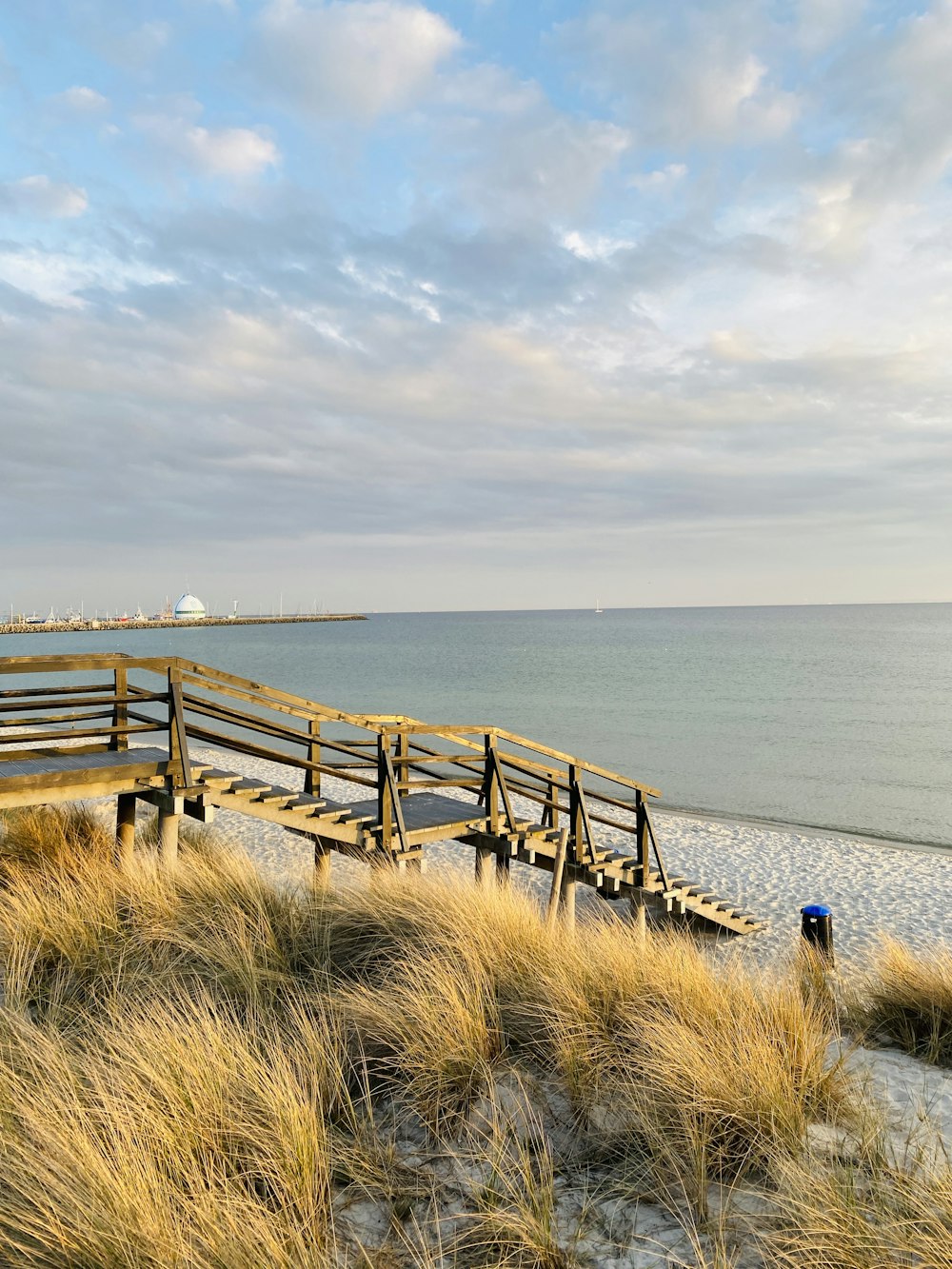 a wooden dock over water