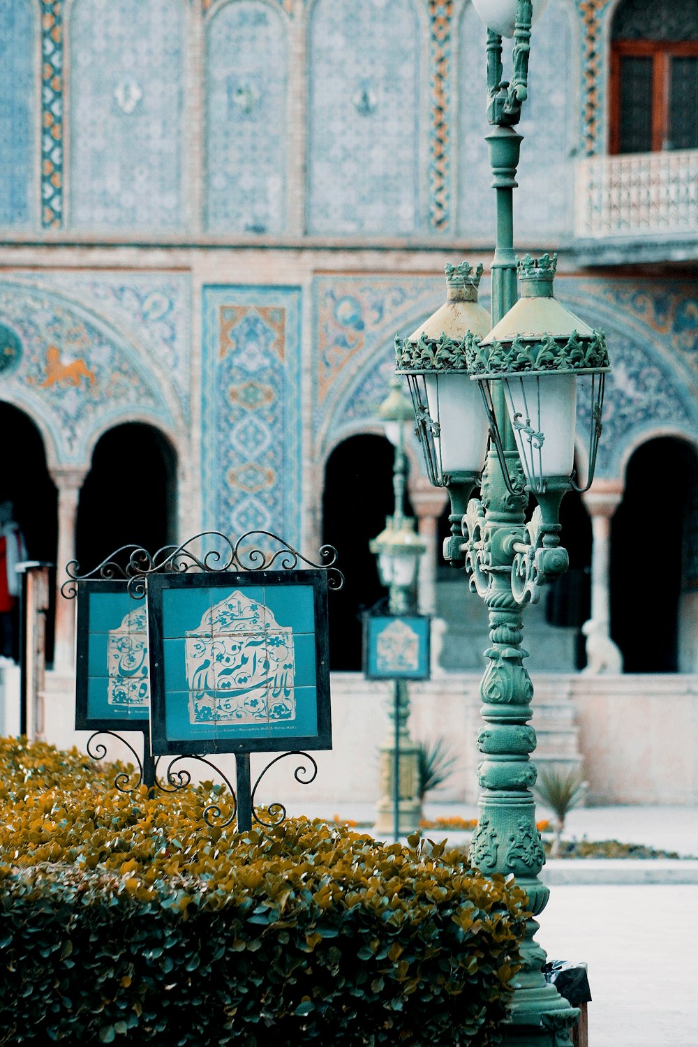 a large ornate building with a sign