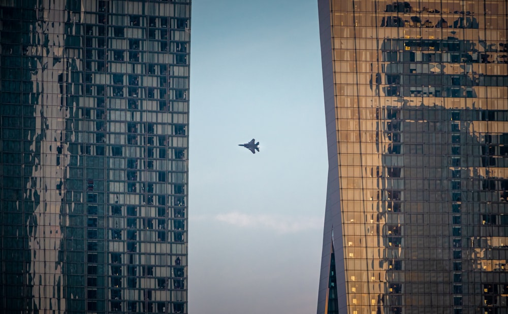 a plane flying over a city