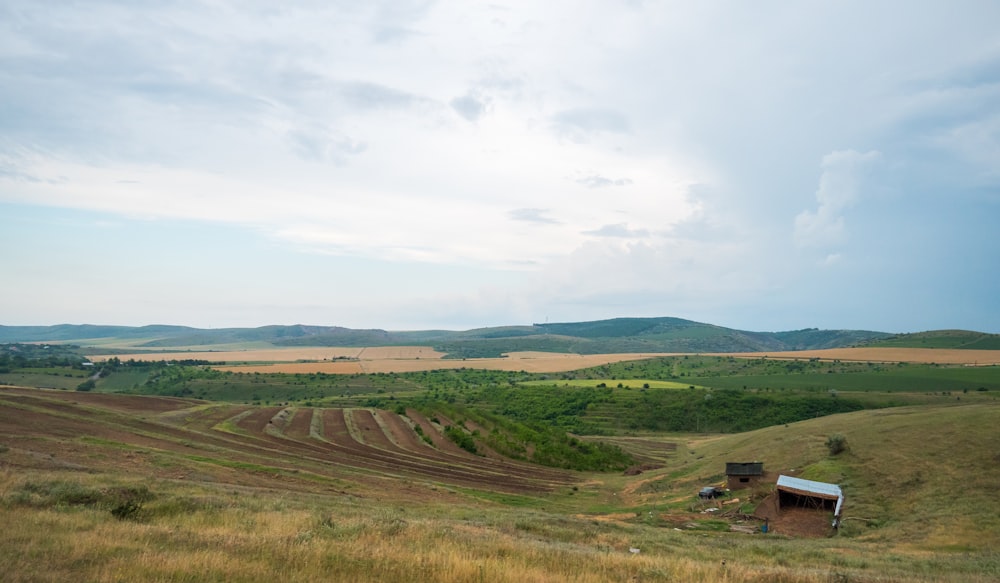 a farm with a house in the middle