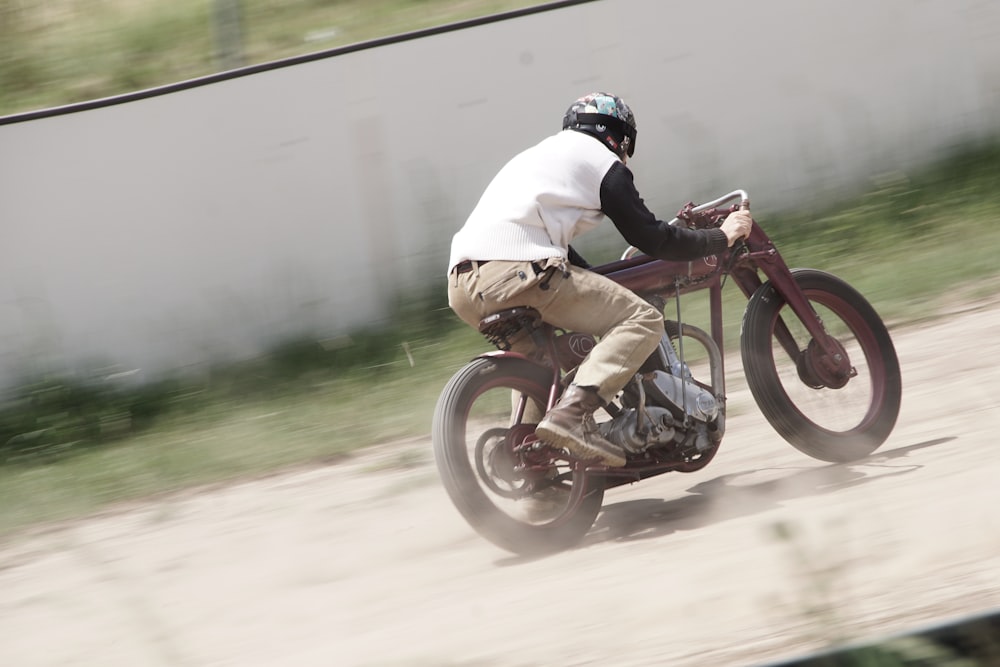 a man riding a motorcycle