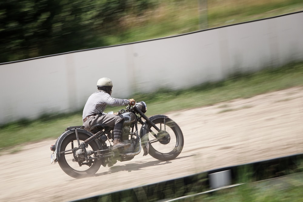 a man riding a motorcycle