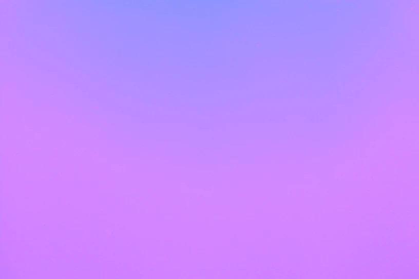 A vibrant user profile card showing a rounded profile photo with a blue-purple gradient background.