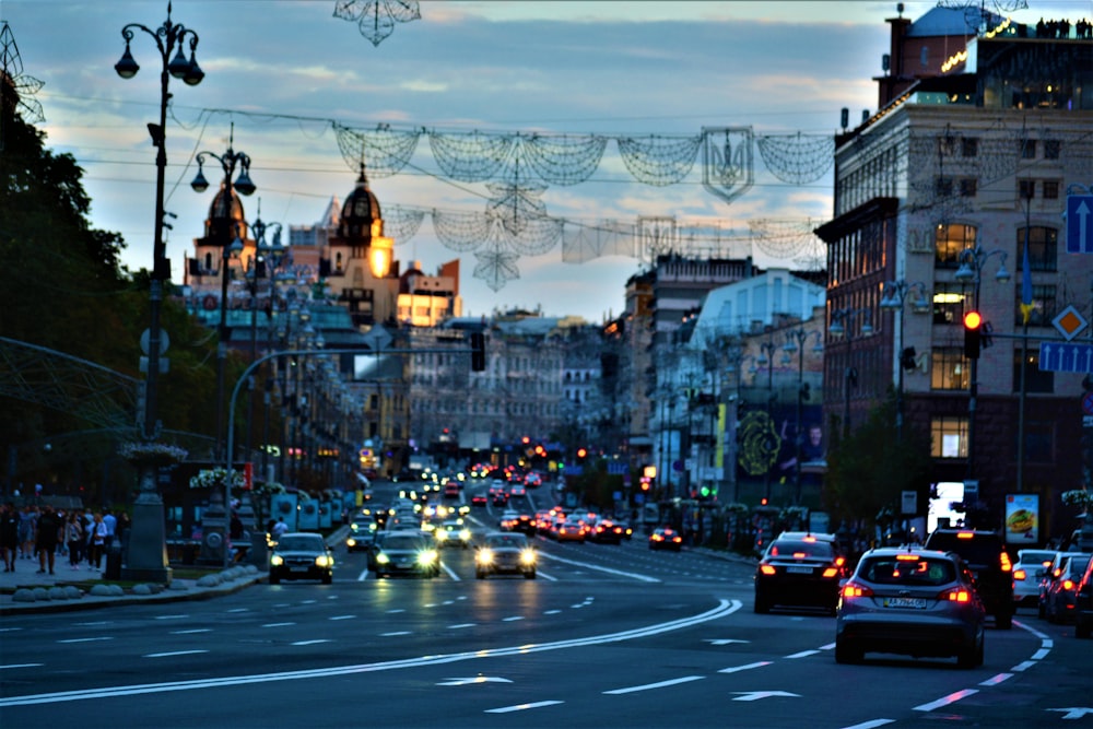 a busy street with cars and buildings