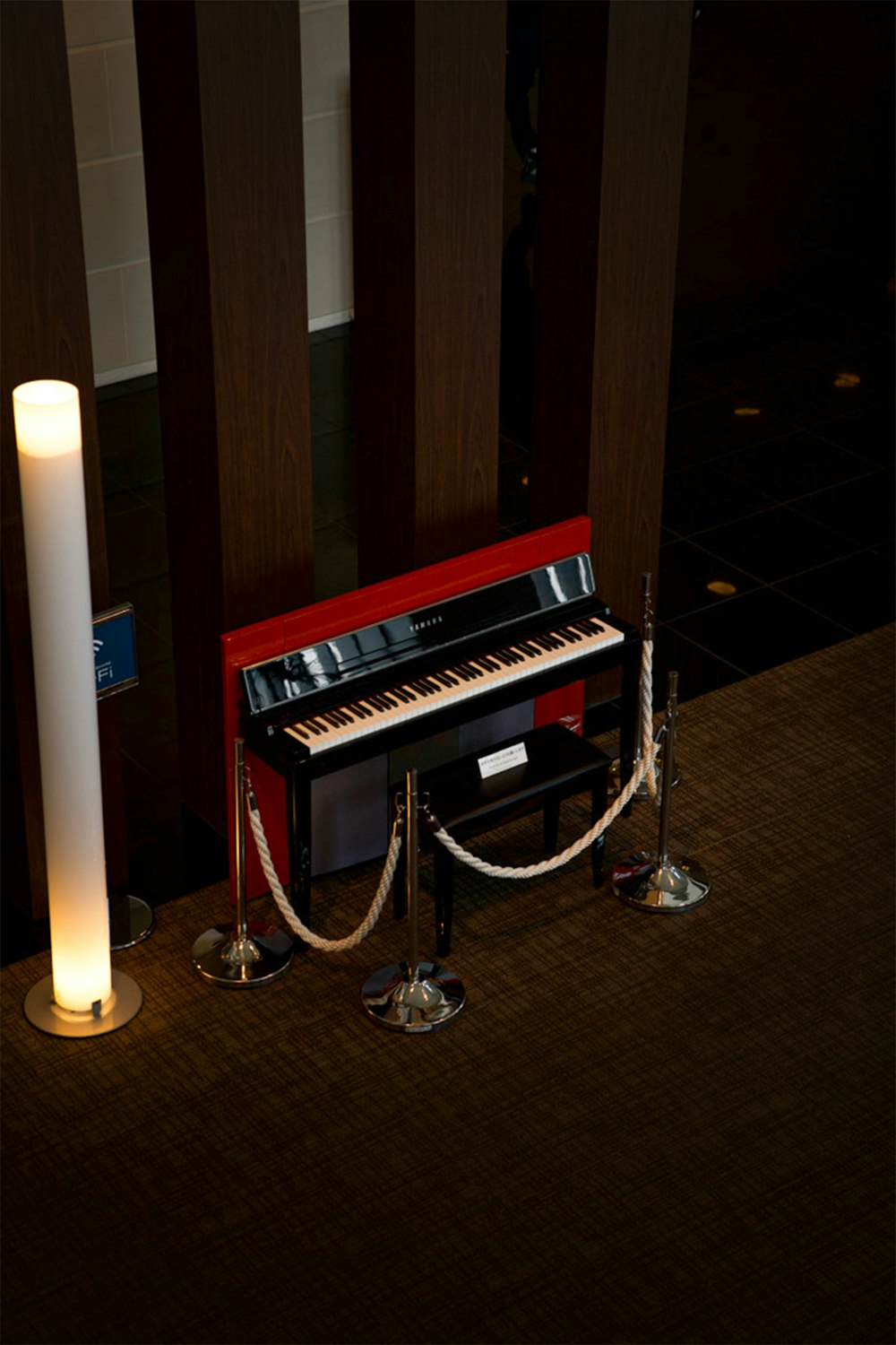 a piano with a candle