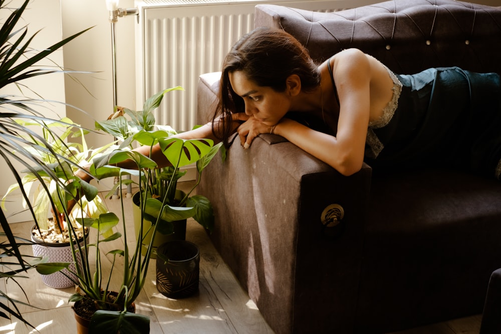 a woman lying on a couch