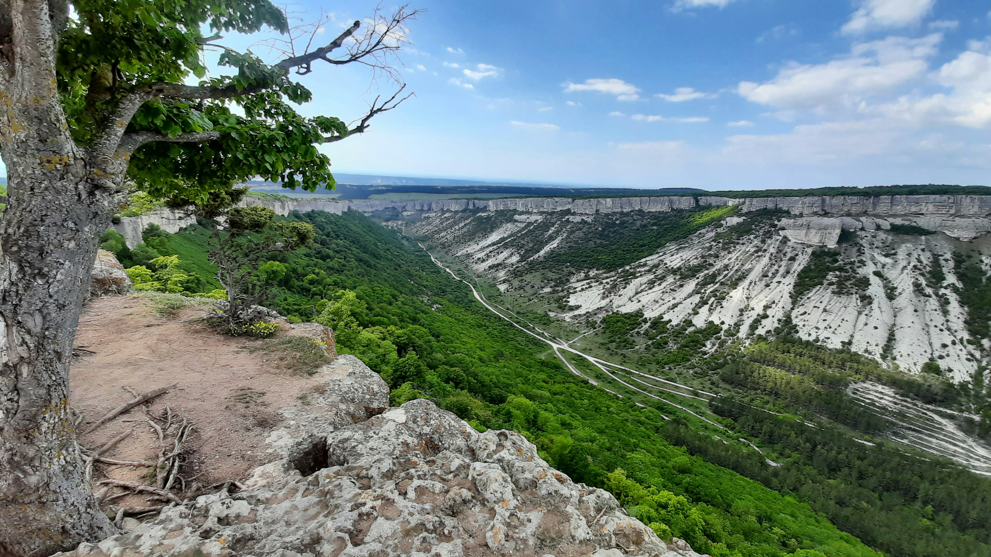 a landscape with a large waterfall