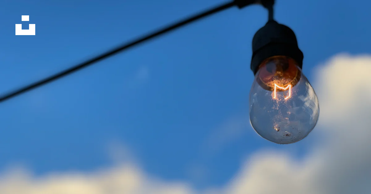 A Light Bulb From A Wire Photo Free Blue Image On Unsplash A Light Bulb From A Wire Photo Free Blue Image On Unsplash