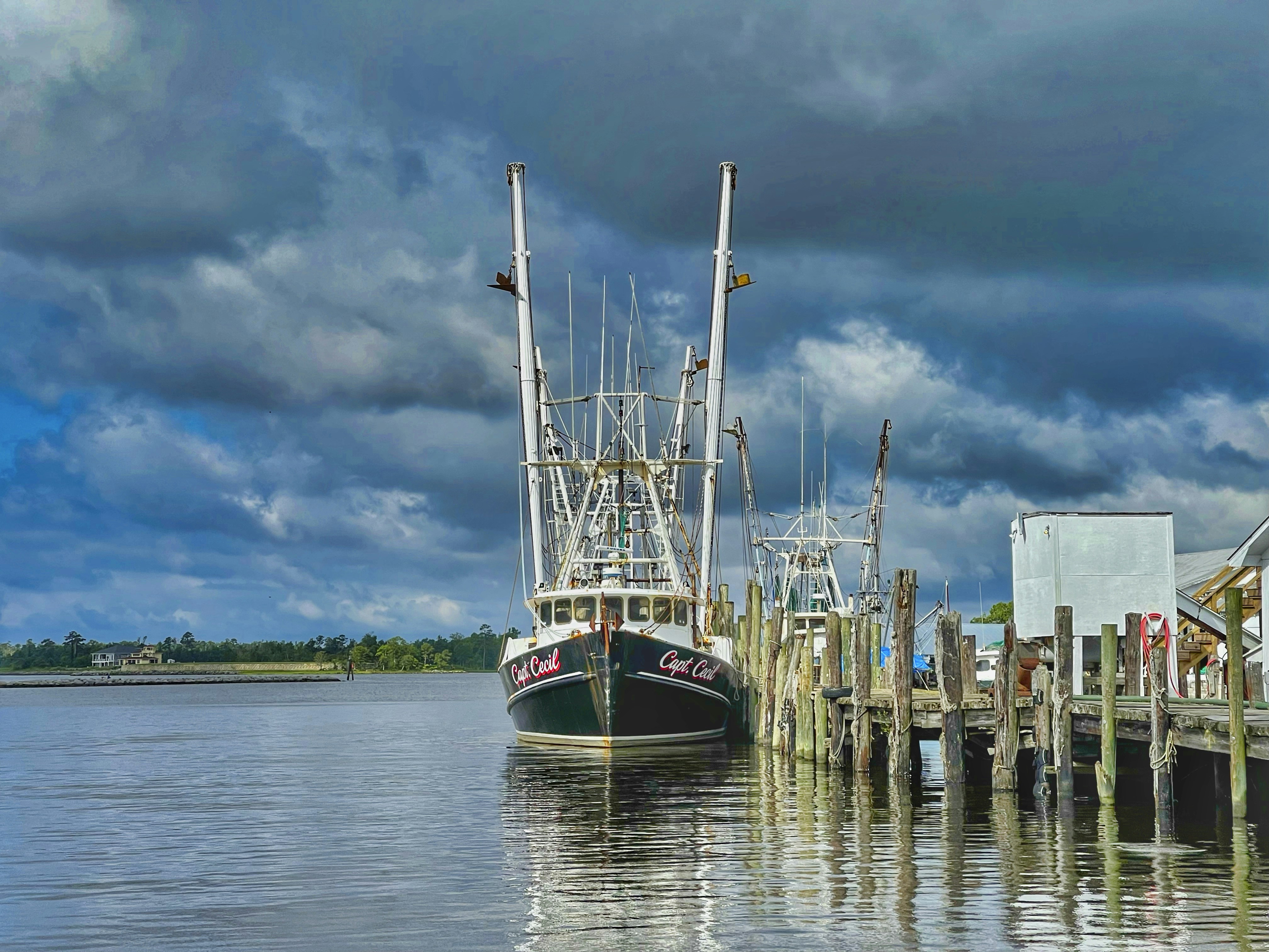 a boat docked at a pier