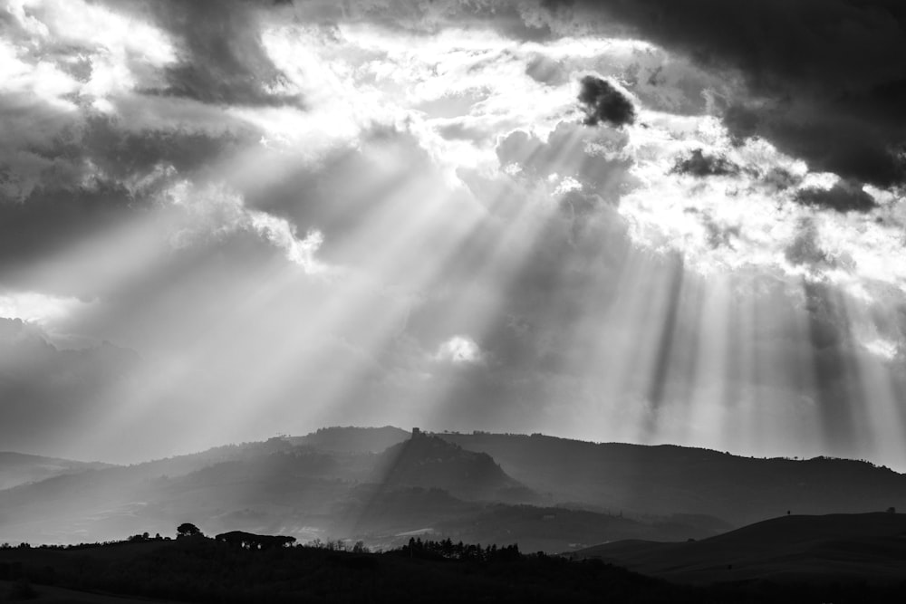 a mountain range with clouds