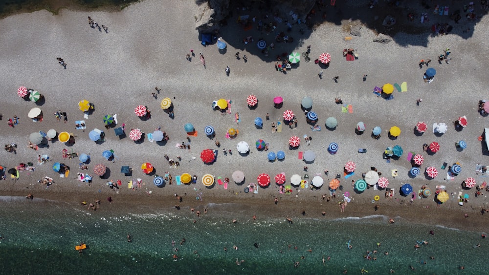 a group of people playing in the sand