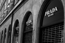 a building with windows and a sign on the side