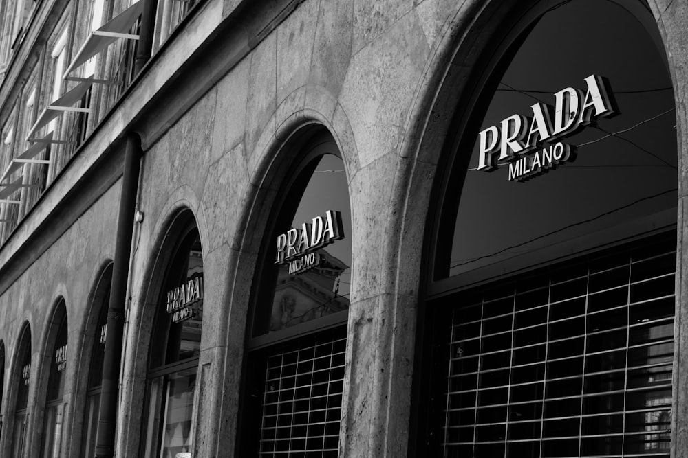 a building with windows and a sign on the side