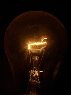 A detailed close-up of a nuclear warhead's intricate components glowing under soft light.