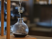 a drop of water being poured into a glass