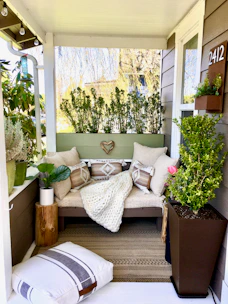 a couch with pillows and pillows