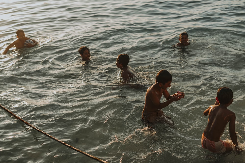 a group of people in the water