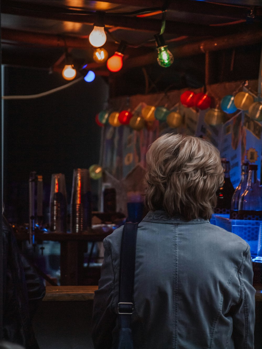 a person looking at a bar