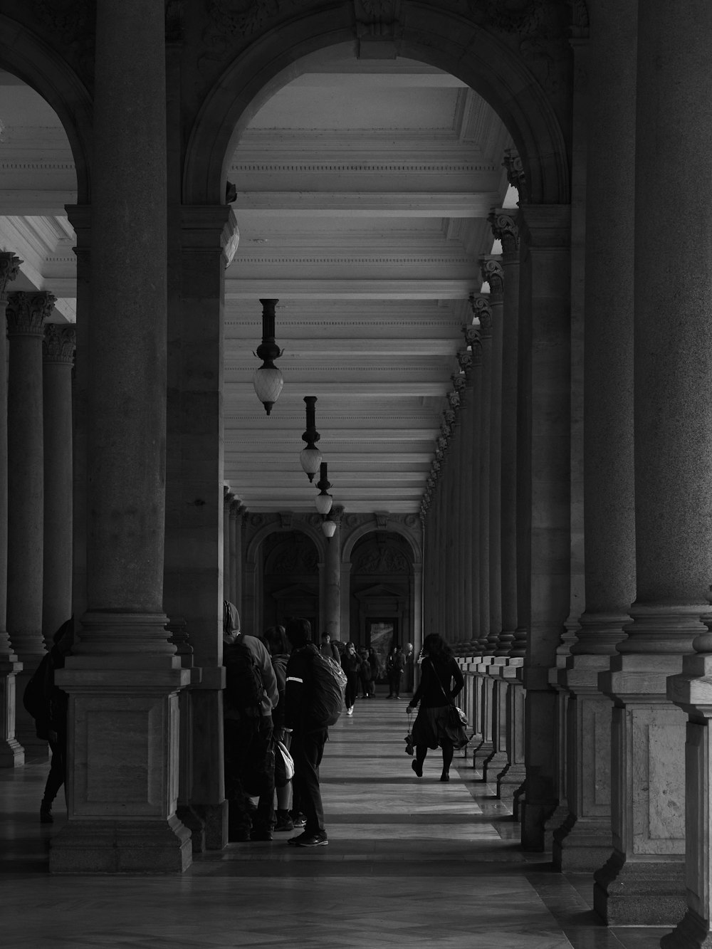 people walking in a building