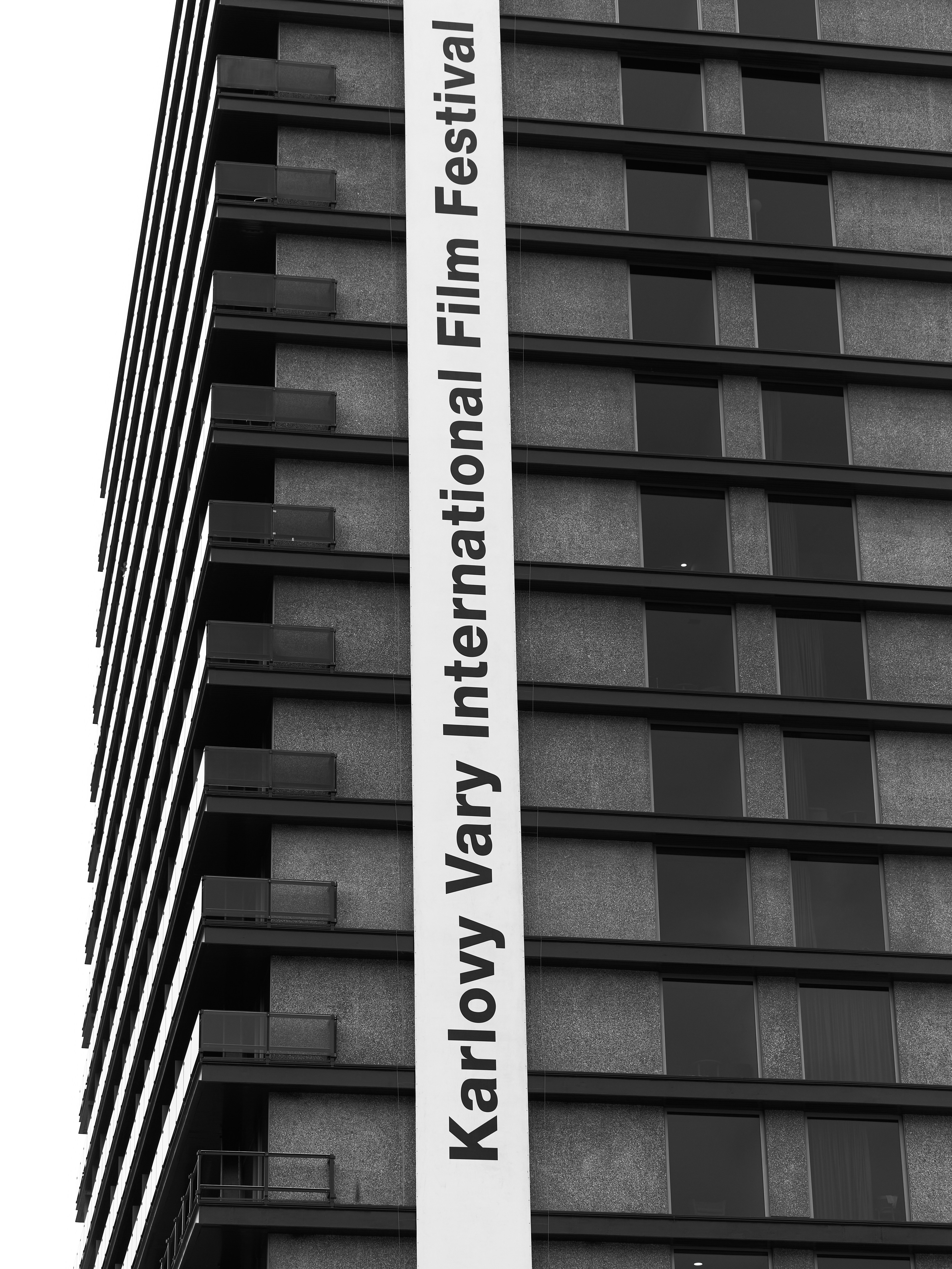 a tall building with a sign on it