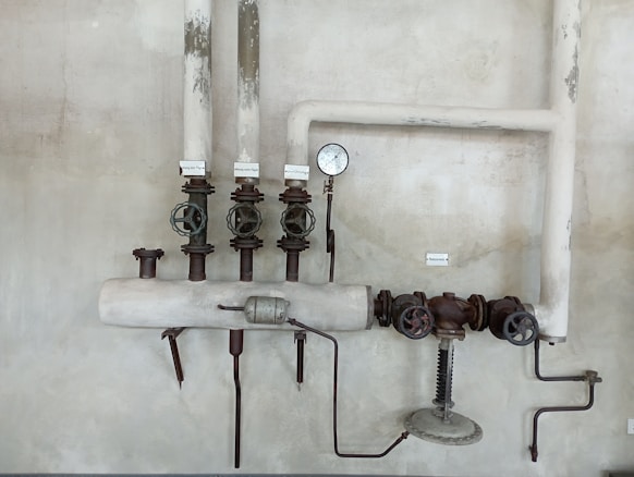 Pipes and plumbing system before cleaning