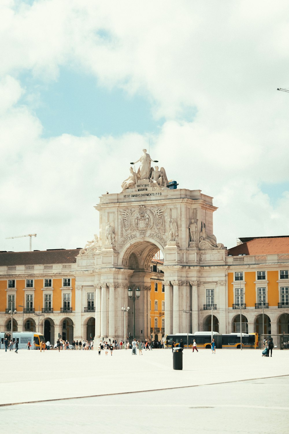 a large building with a statue on top of it