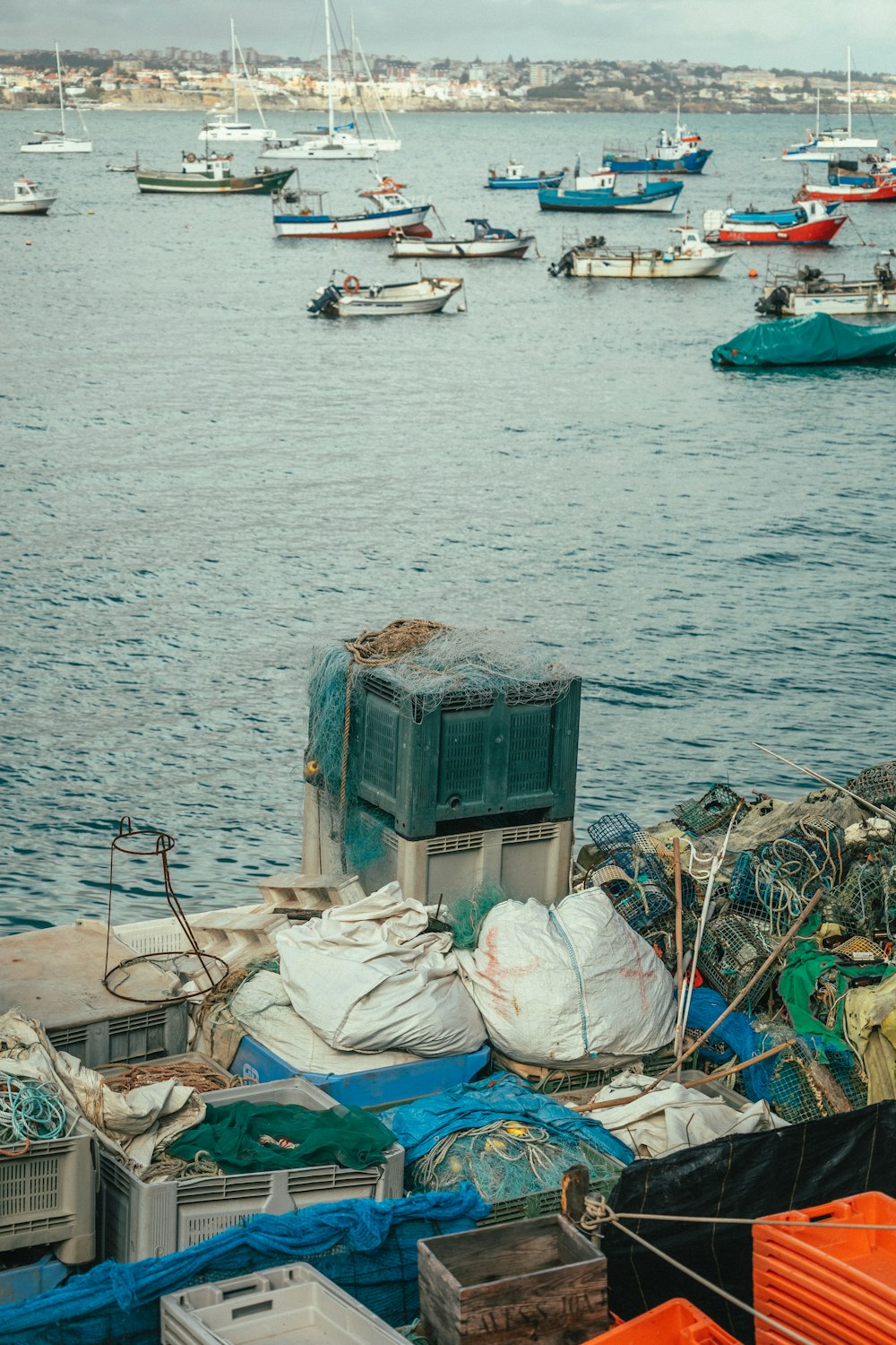 a boat is docked next to a body of water