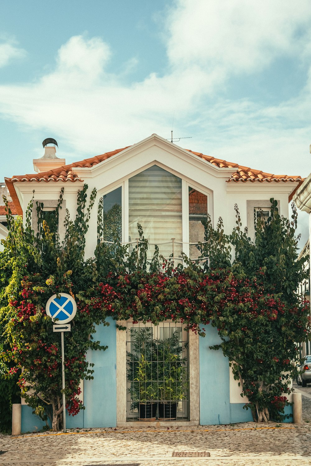 a house with a sign in front of it