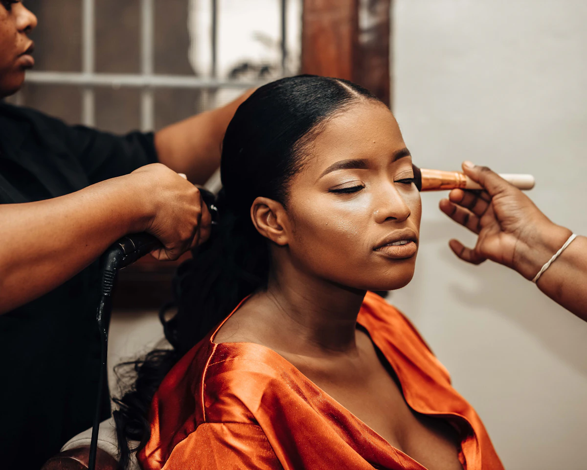 Makeup artist working on a client's look