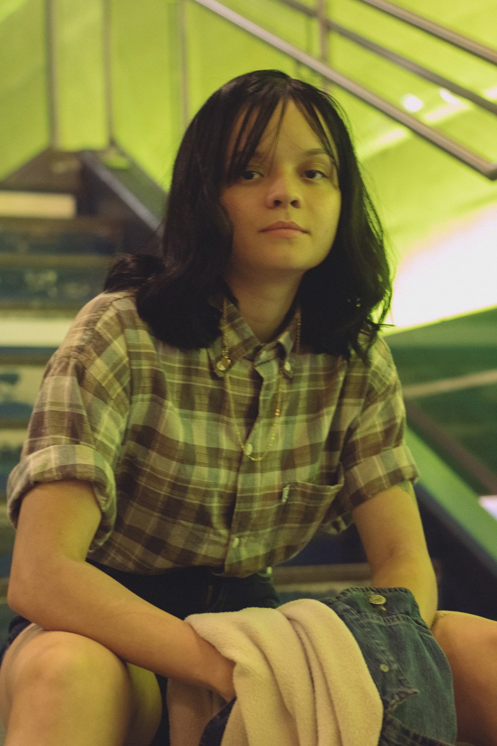 a woman sitting on a bench