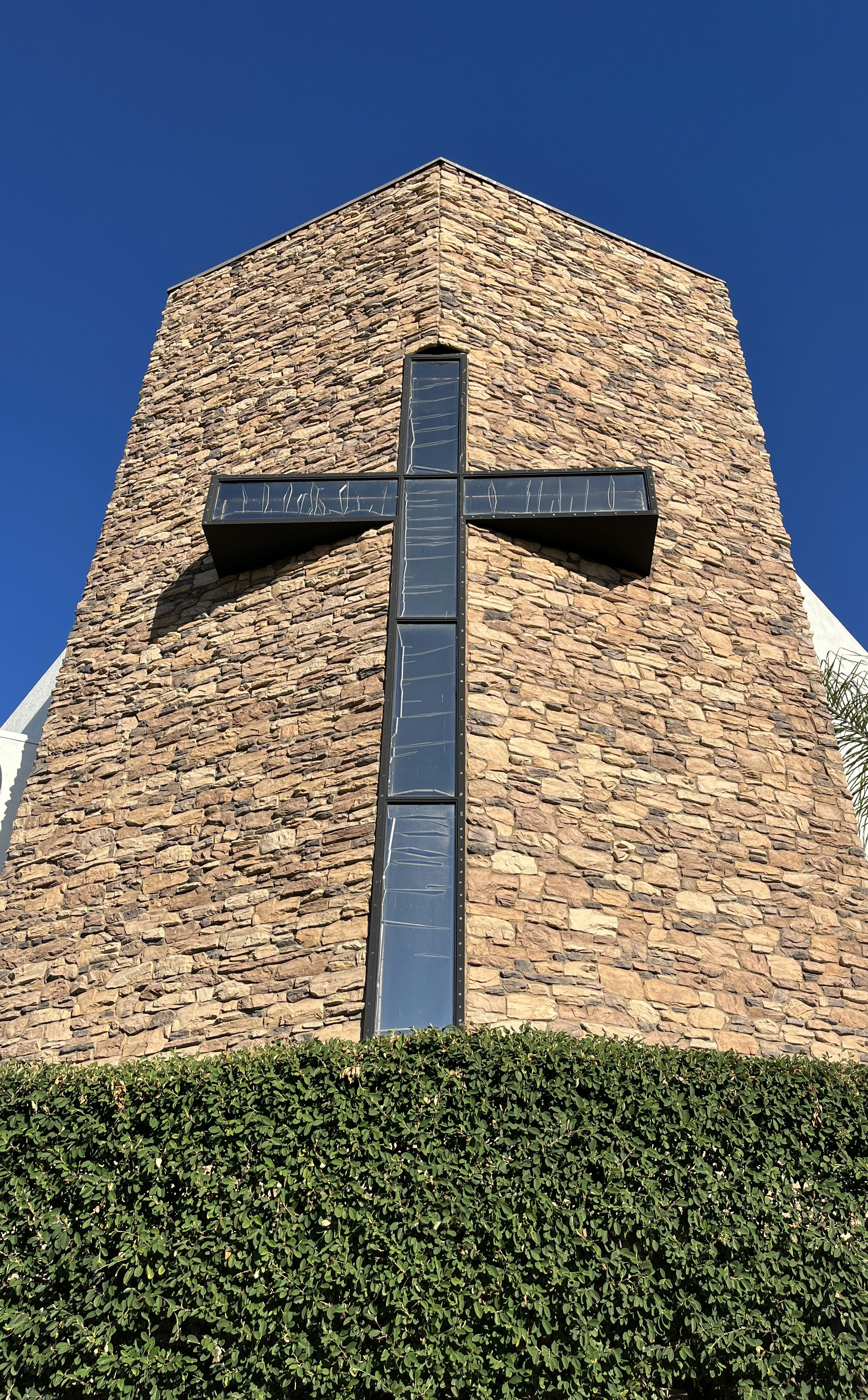 a brick building with a sign on it