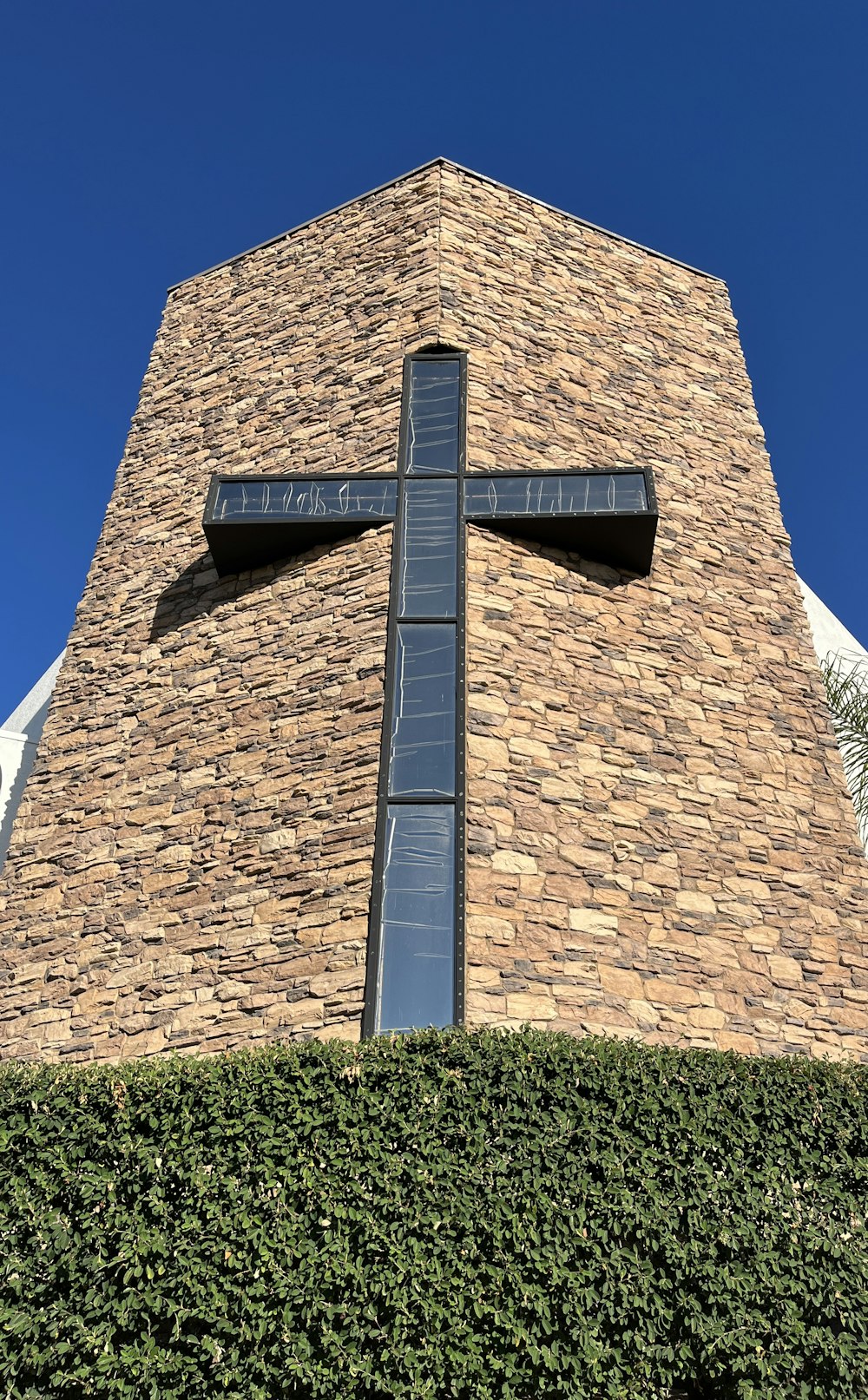 a brick building with a sign on it