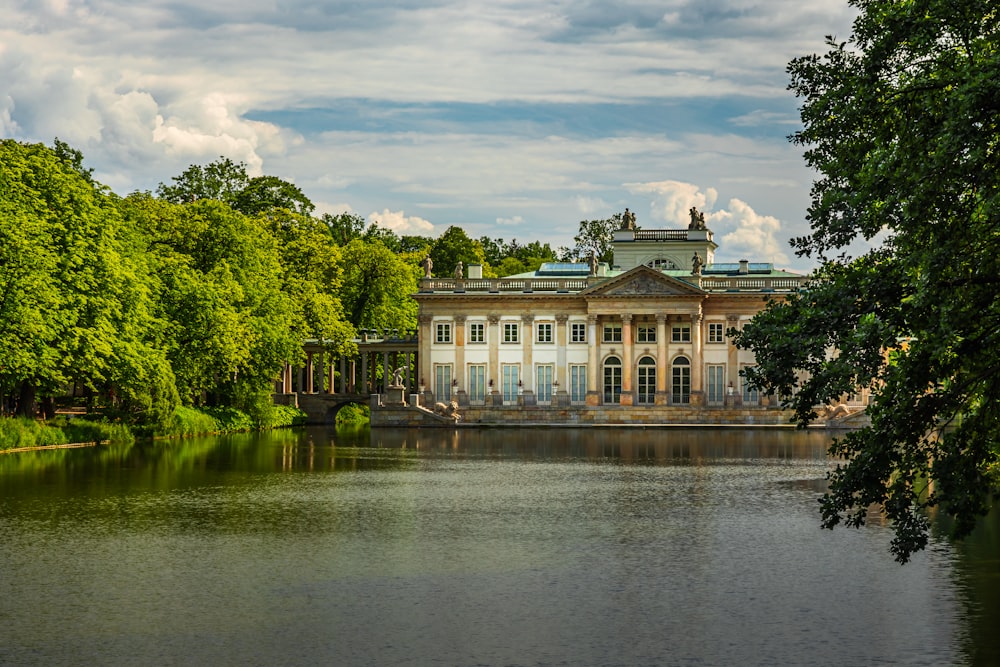 a building with a pond in front of it