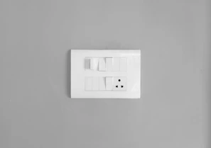 a white square object with a black and white logo on it