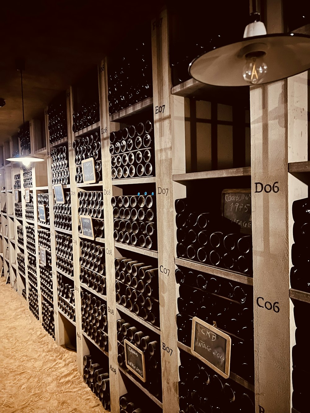 a large room with shelves of wine bottles