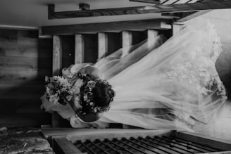 a bride and groom kissing