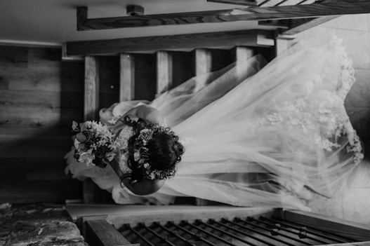a bride and groom kissing
