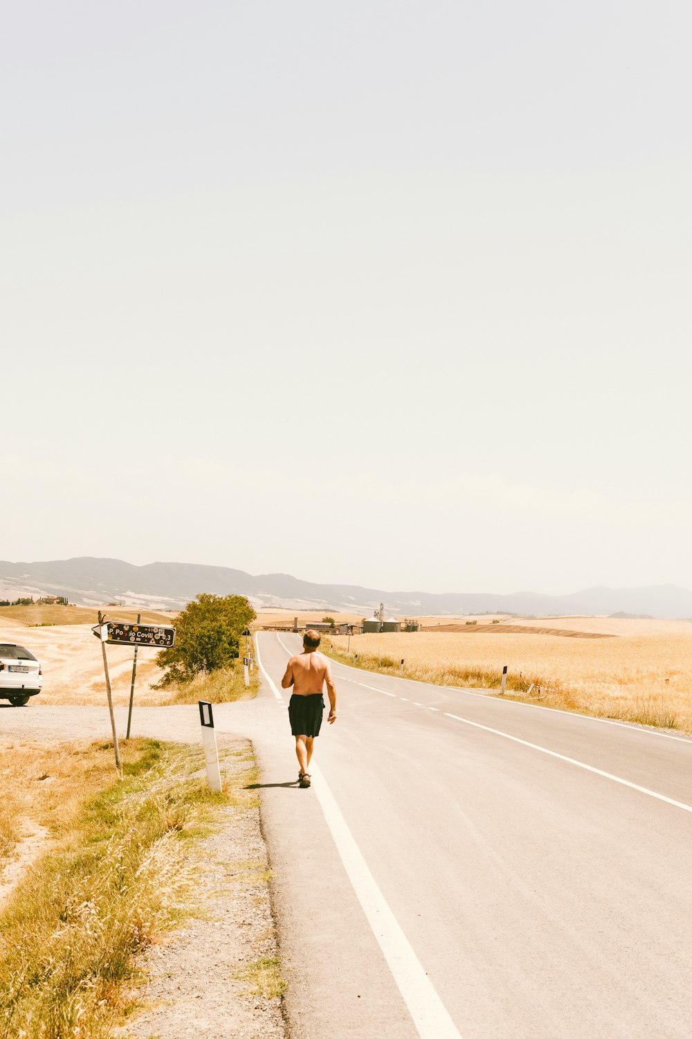 a person running on a road