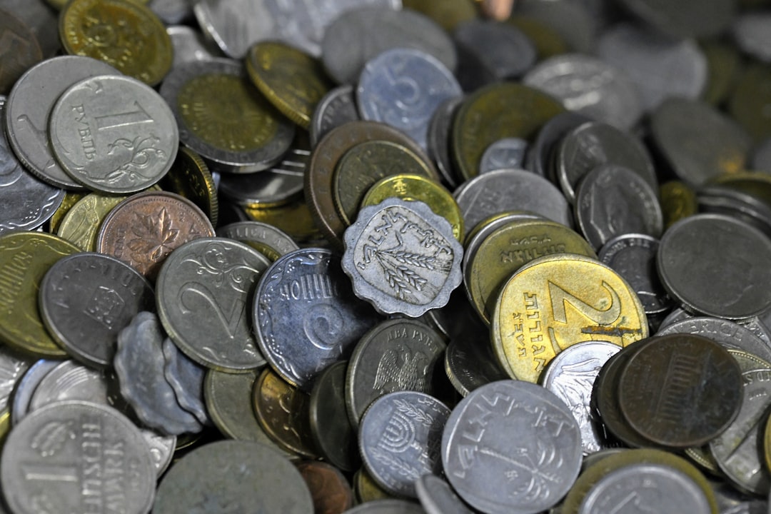 a pile of coins, Captured all of these money coins of different world currency.