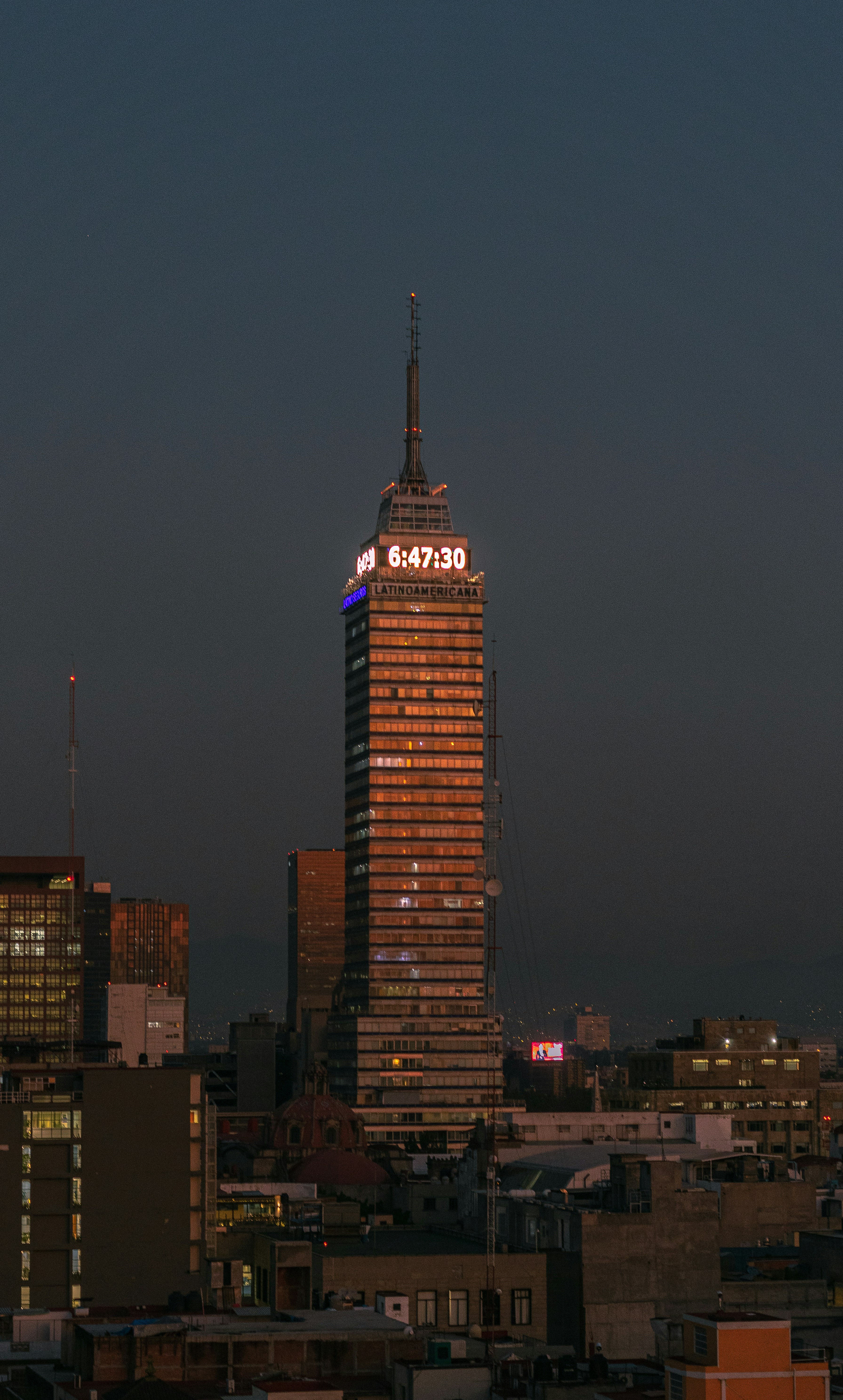 a tall building with lights at night