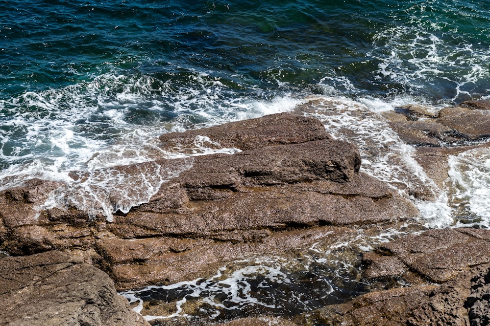 waves crashing on rocks