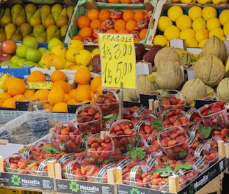 a bunch of fruits in a market