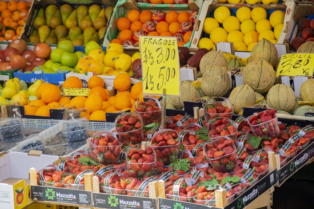 a bunch of fruits in a market