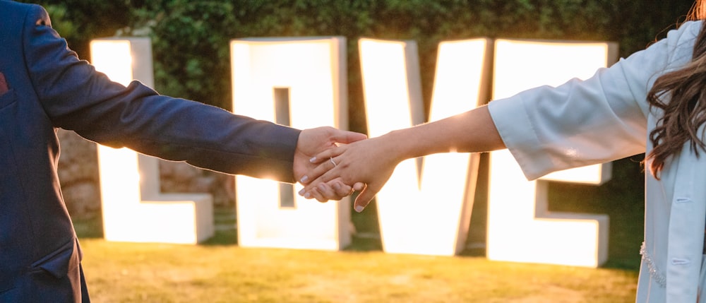 a man and woman shaking hands