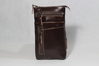 a brown leather purse