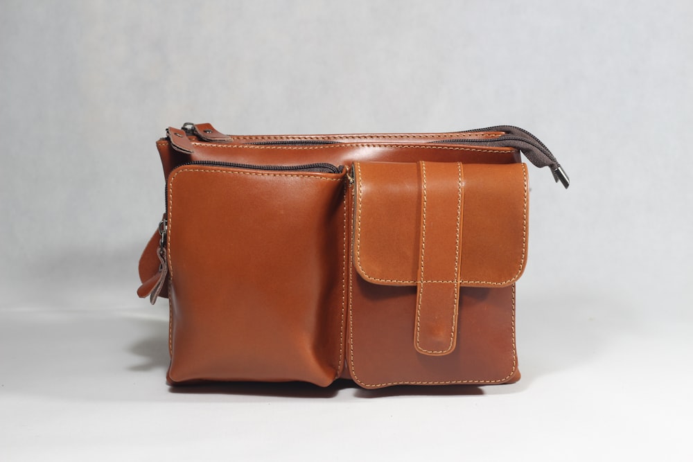 a brown leather purse