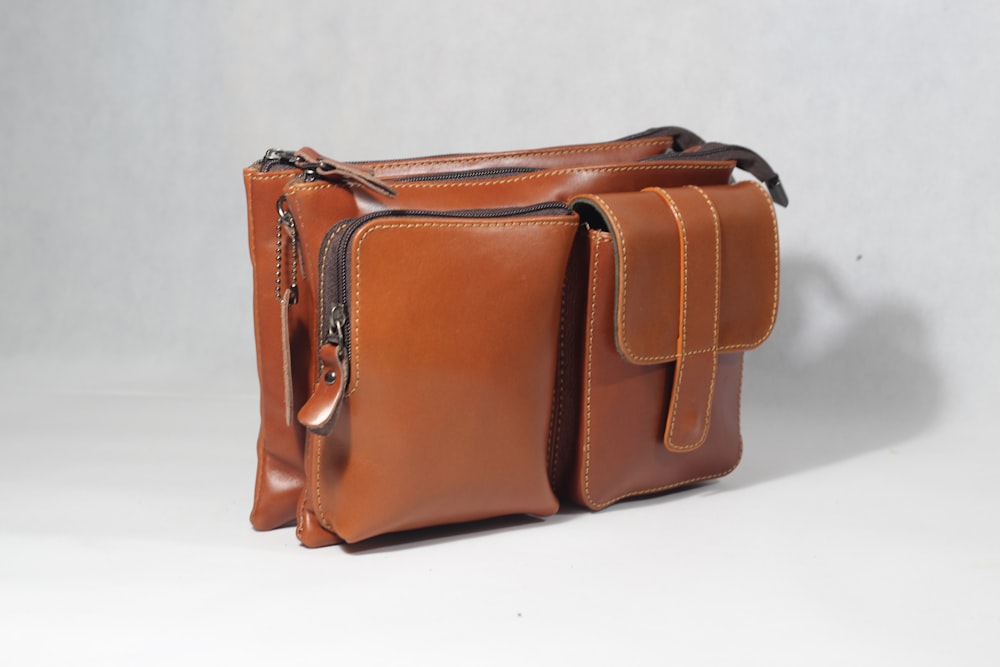 a brown leather purse