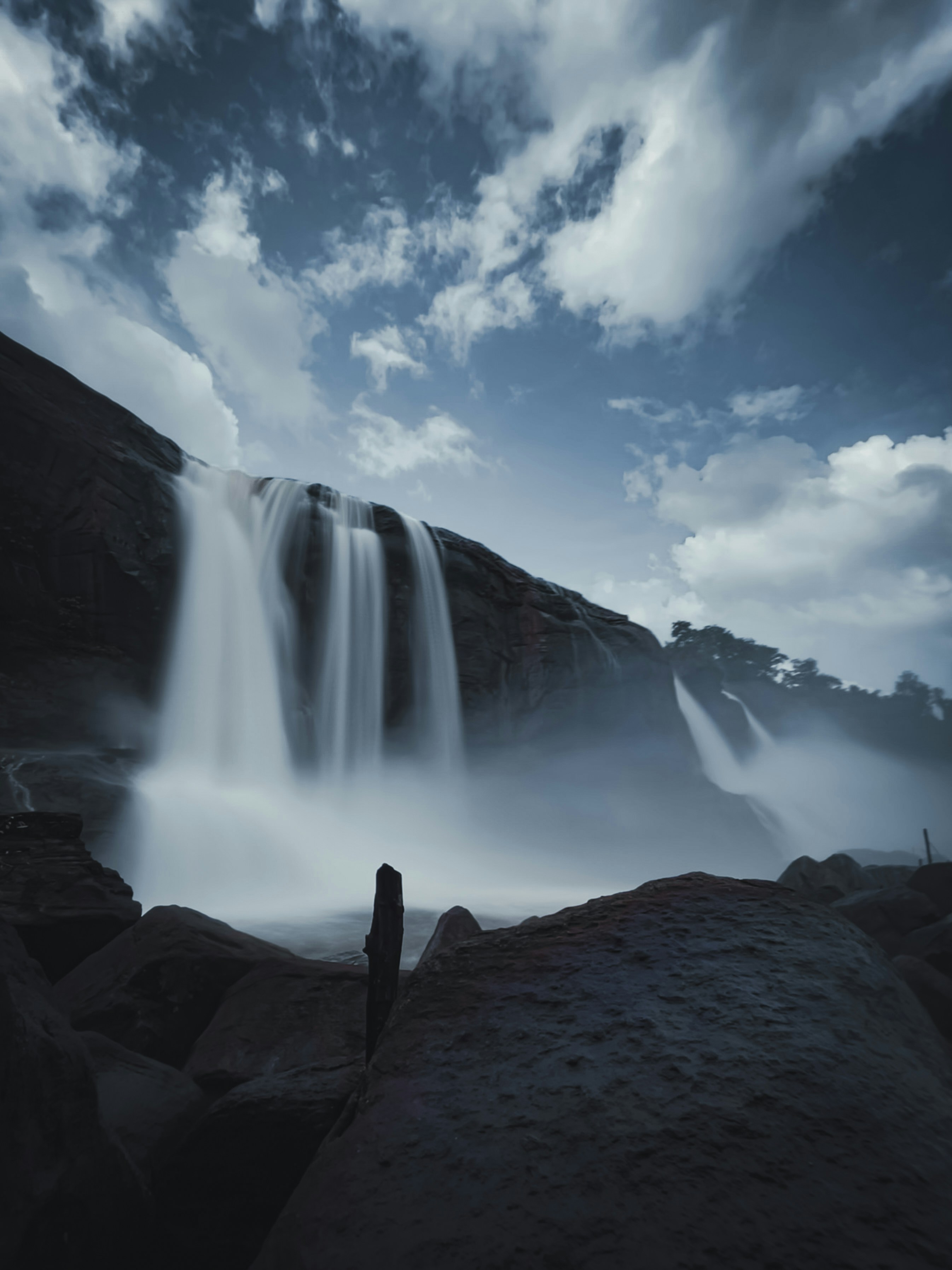 a waterfall in a rocky place